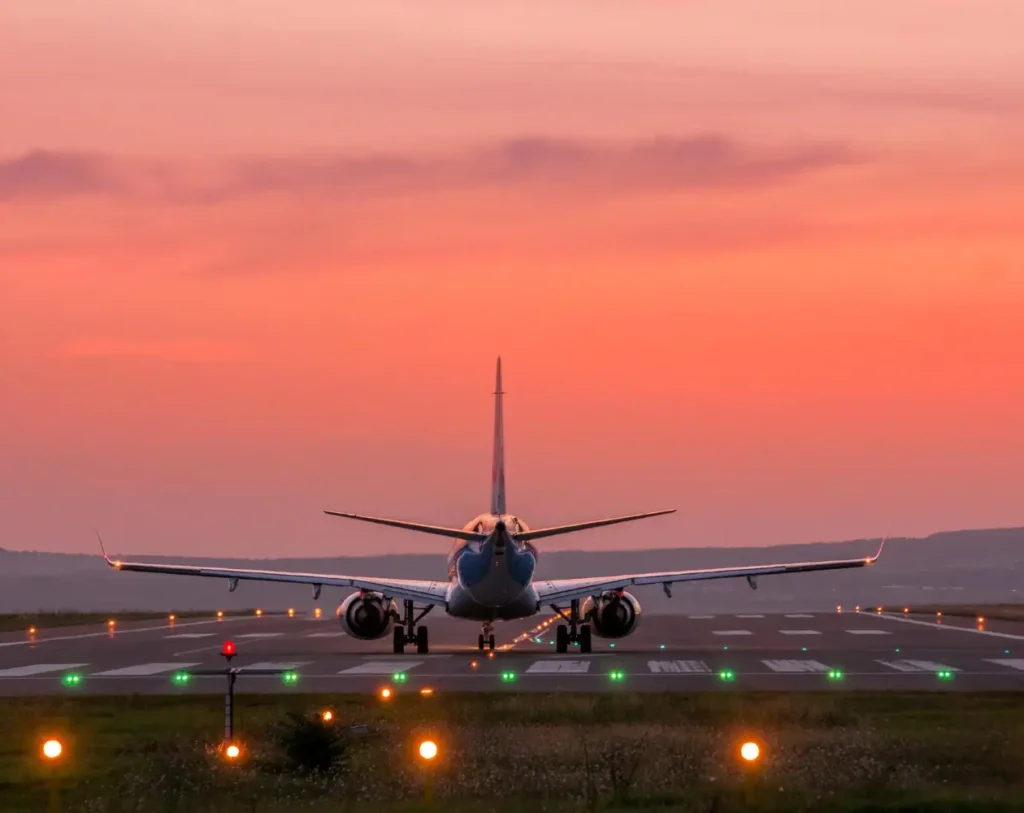 airplane-flying-sky-sunset